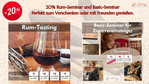 Zigarrenseminar mit Teilnehmern beim Verkosten und Anzünden von Zigarren unter Anleitung eines Experten.  Zigarren und kubanischer Rum in stilvollem Tasting-Setup – Genuss-Pairing beim Zigarrenseminar